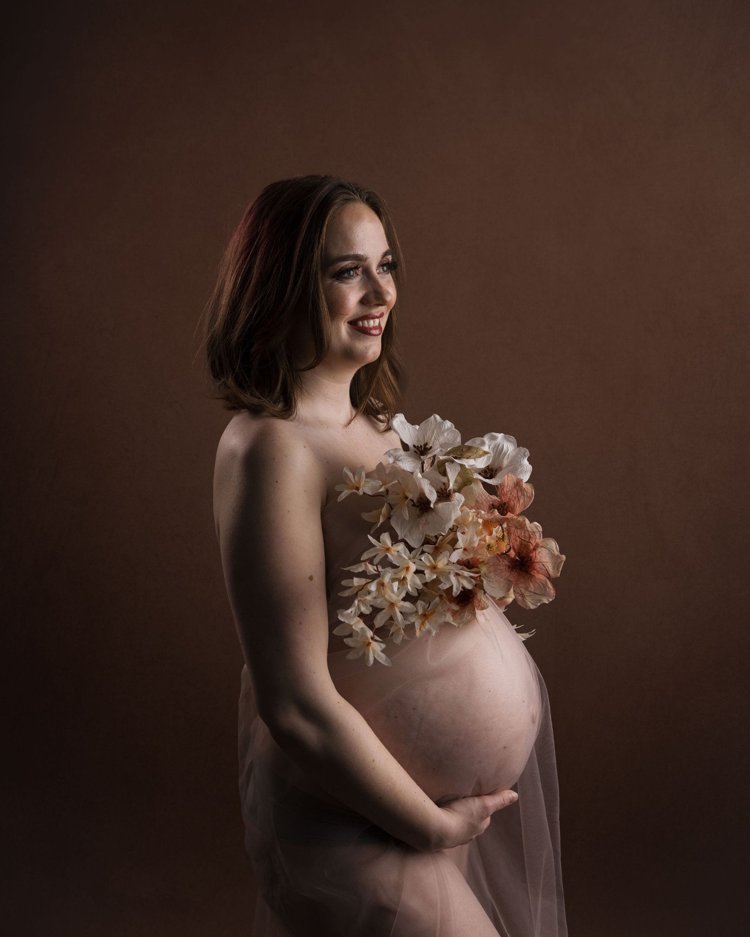 Gravidfotografering med blommor